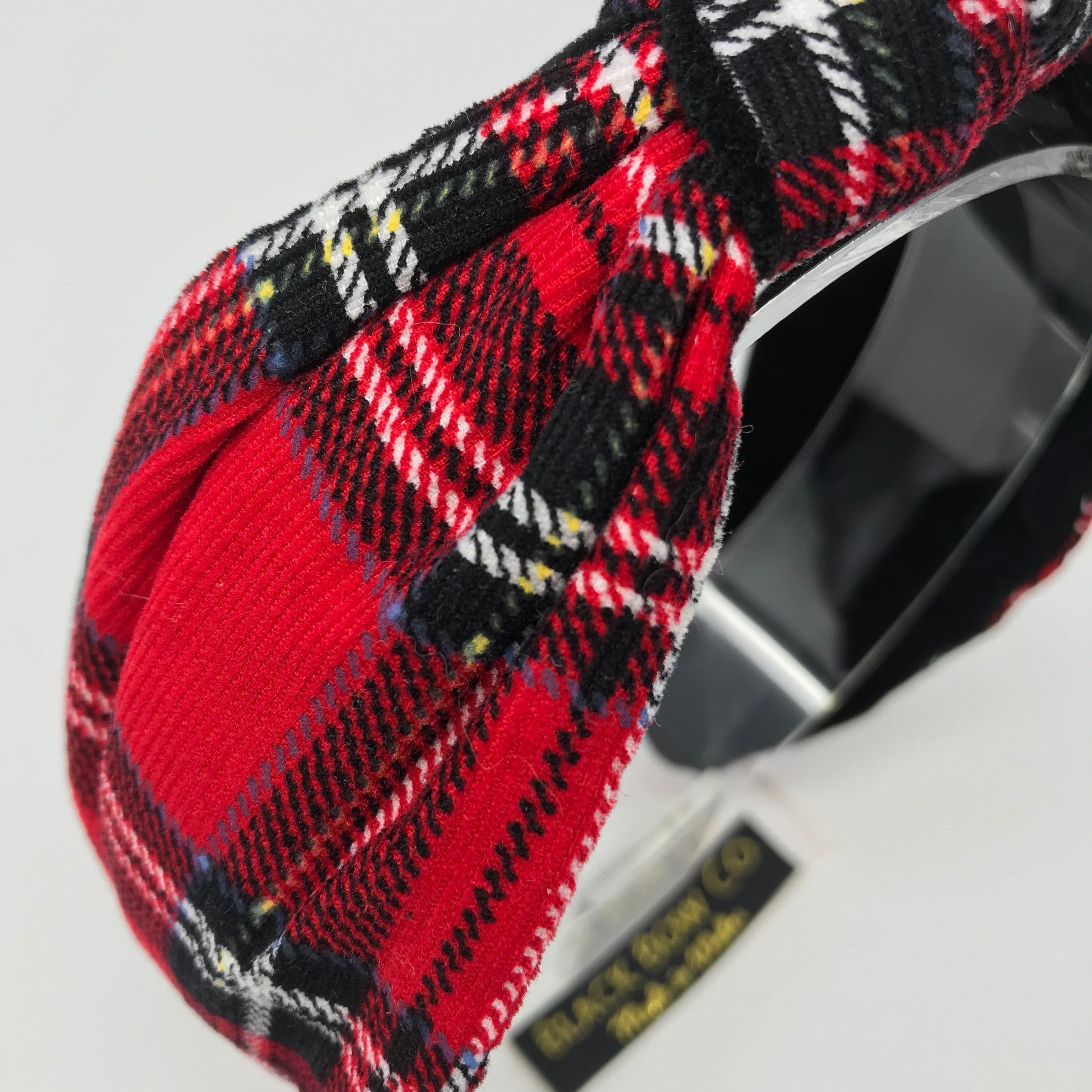 Red tartan headband close up 